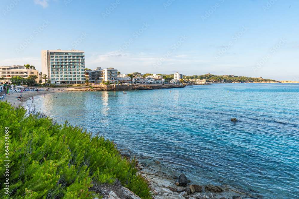 Obraz premium The beautiful coast with the turquoise water of the Mediterranean Sea and stunning cliffs of Cala Ratjada on Majorca Island, Spain