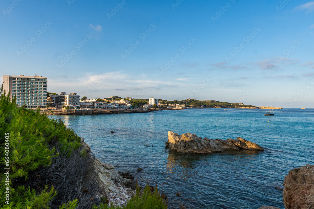 The beautiful coast with the turquoise water of the Mediterranean Sea and stunning cliffs of Cala Ratjada on Majorca Island, Spain The beautiful coast with the turquoise water of the Mediterranean Sea and stunning cliffs of Cala Ratjada on Majorca Island, Spain