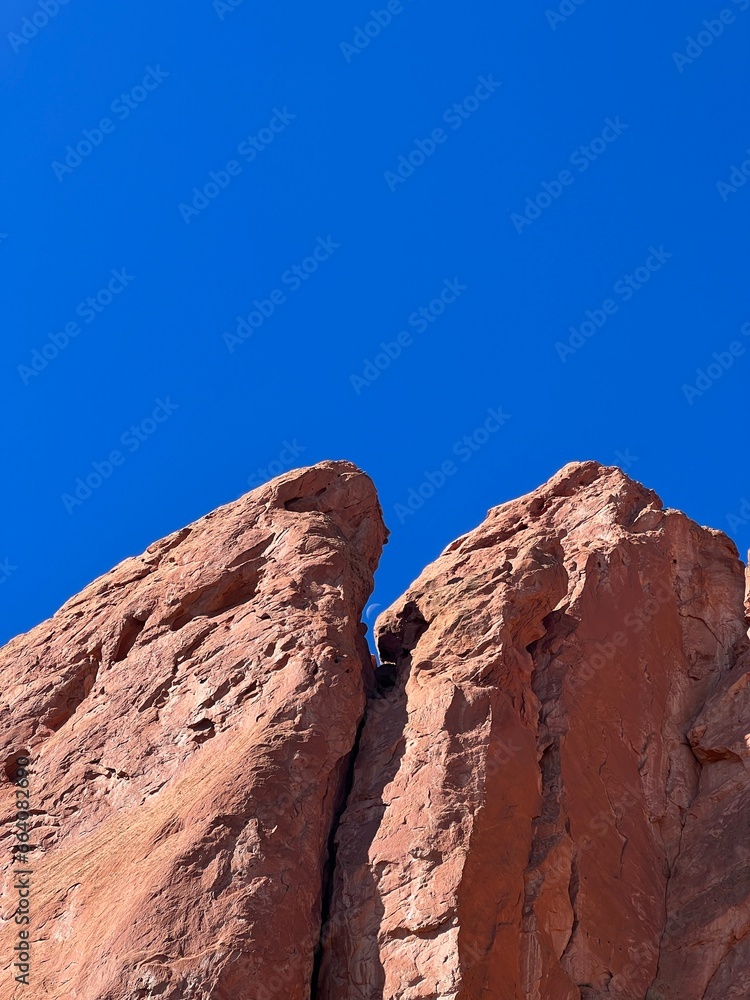 Majestic Red Rocks and Daytime Moon: A Colorado Dream