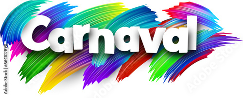 Carnival paper word sign with colorful spectrum paint brush strokes over white.