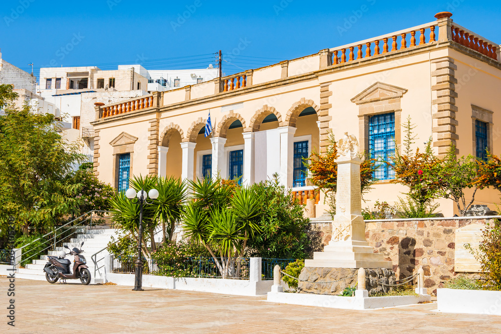 Town hall square and typical Greek architecture in Plaka village, Milos island, Cyclades, Greece