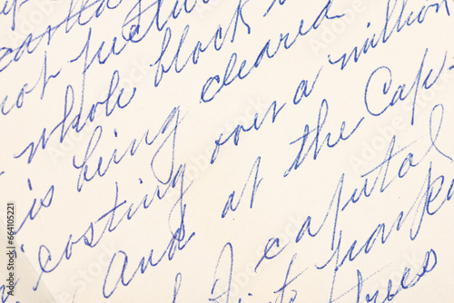 Closeup of a handwritten letter in cursive background photo