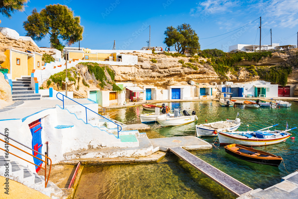 Fishing boats and colorful fishemen houses in Mandrakia port, Cyclades, Milos island, Greece