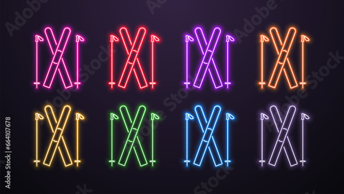 A set of neon ski icons with poles in the colors blue, pink, yellow, red, orange, red and white on a dark background.