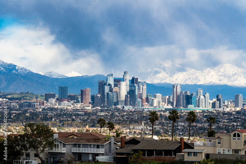 Downtown Los Angeles, CA Skyline with Snowy Mountains