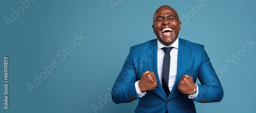 Businessman fired up, excited and full of energy photo
