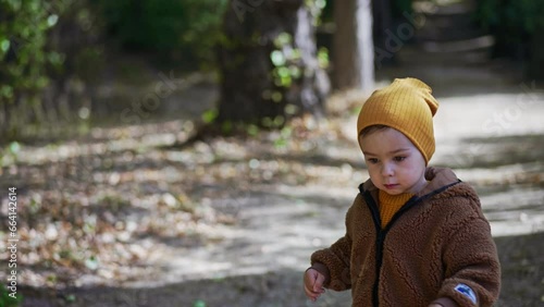 Wallpaper Mural Caucasian kid running in the autumn park. Lovely baby boy having good time in nature on sunny day. Torontodigital.ca