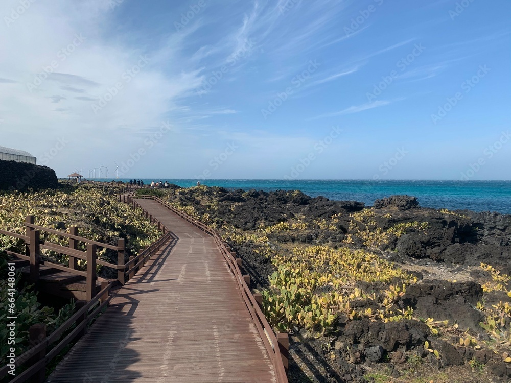Fototapeta premium An oceanfront promenade in Jeju Island, South Korea