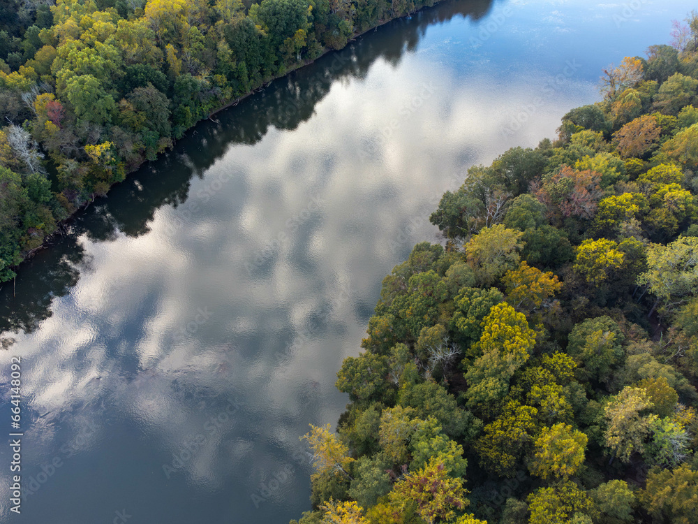Looking down on a calm Catawba River with reflected clouds in South Carolina
