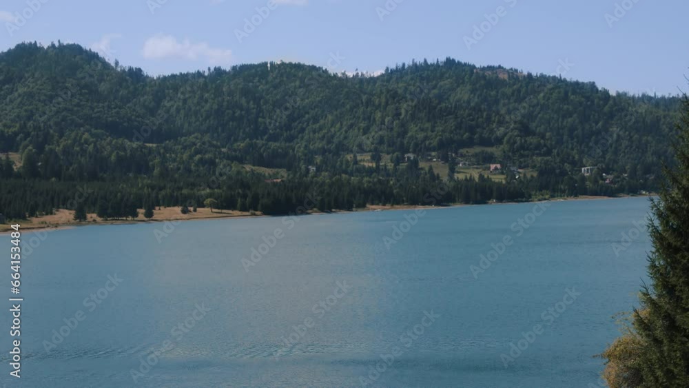 4k Timelapse mountain landscape, lake , green mountains rises above calm expanse of water 4k Timelapse mountain landscape, lake , green mountains rises above calm expanse of water