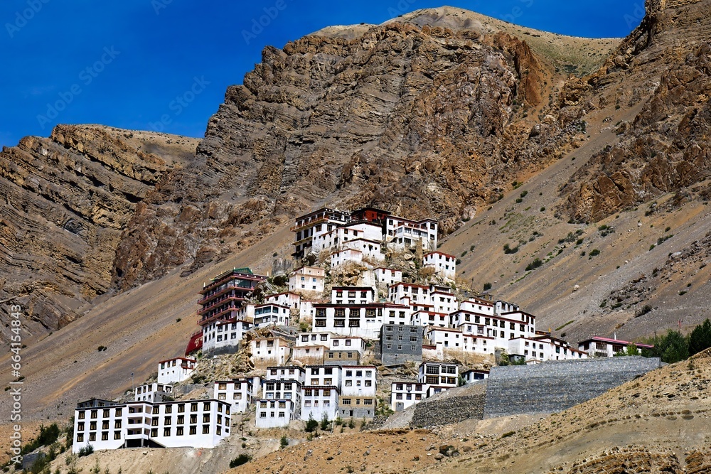 Nestled in the Spiti Valley of the Indian Himalayas, Key Monastery showcases stunning Tibetan architecture against a majestic mountain backdrop.