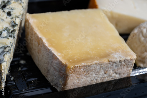 French cheeses collection, degustation plate, bleu de saint flour, pave de correse cow cheese, tomme de brebis sheep cheese, crottin de chevre goat cheese