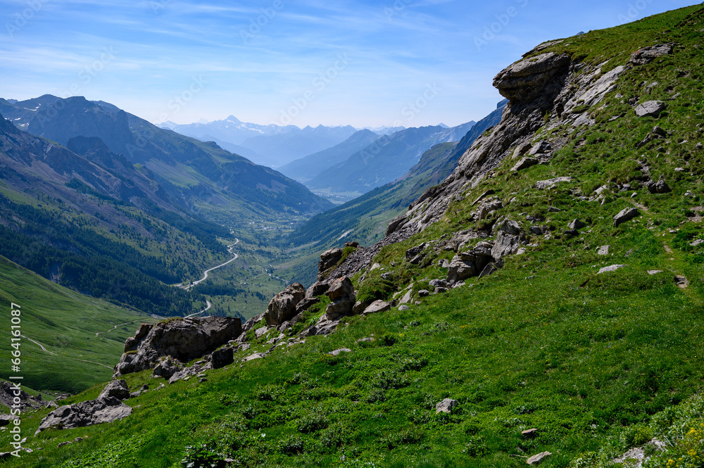 Obraz premium Mountains and alpine meadows views near Col du Lautaret, Massif des Ecrins, Hautes Alpes, France in summer