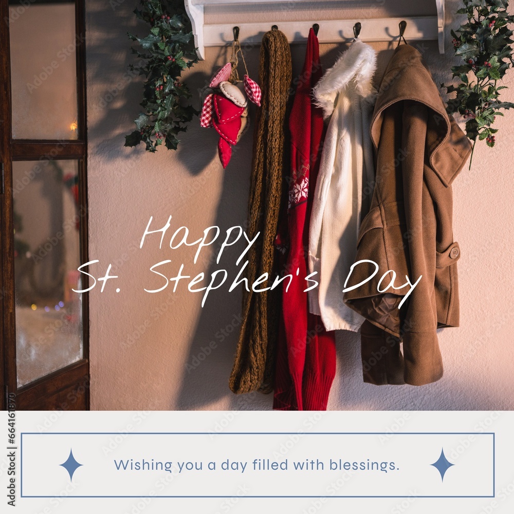 Naklejka premium Composite of happy st stephen's day text over warm clothing hanging on hook at home