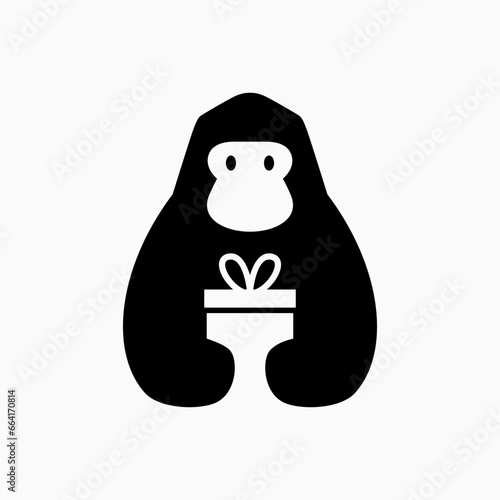 gorilla is holding birthday gift Logo Cartoon Mascot character vector icon illustration