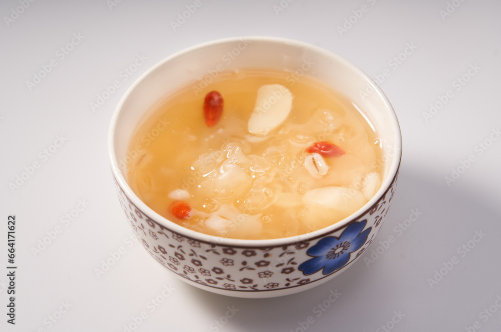 A bowl of sweet and refreshing white fungus syrup, a Cantonese dessert A bowl of sweet and refreshing white fungus syrup, a Cantonese dessert