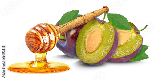 dripping honey and plums isolated on white background
