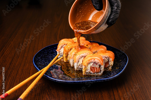 Photo of sushi dish and preparation of sushi for consumption and menu photo