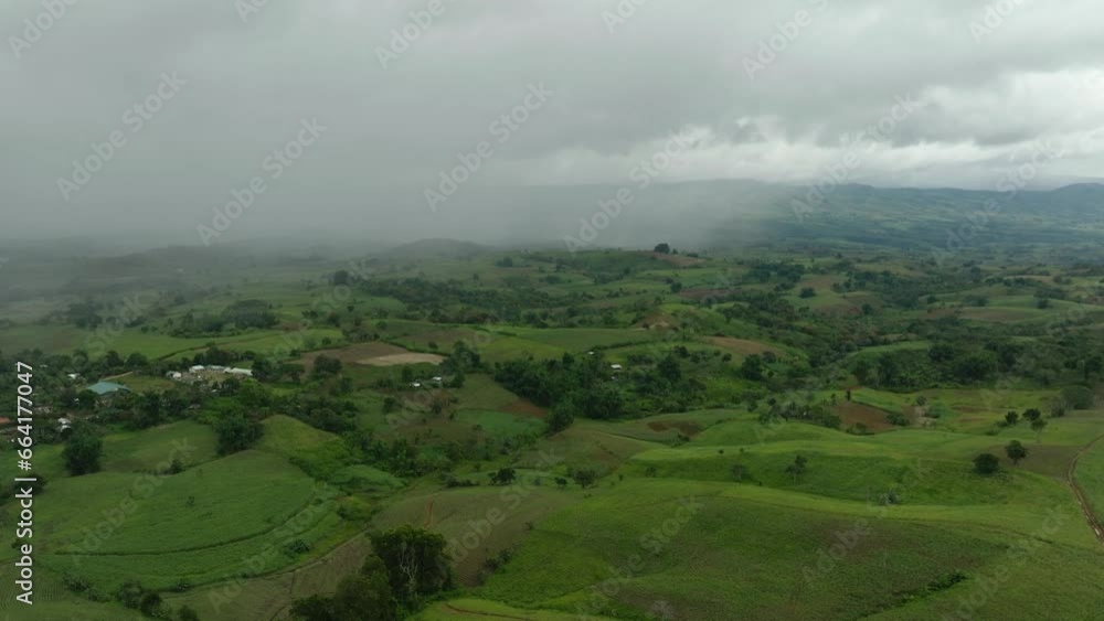 Agricultural land and mountains with green forest. Mindanao, Philippines. Agricultural land and mountains with green forest. Mindanao, Philippines.