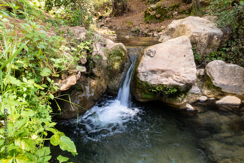 The small  waterfall on the Amud stream flows into the Nahal Amud National Natural Park in Western Galilee in northern Israel