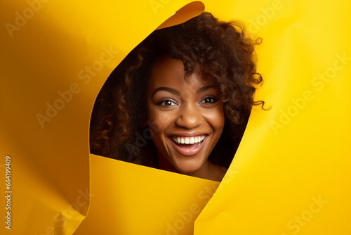 A woman or girl smiles against a pastel background with holes in advertising style © toonsteb