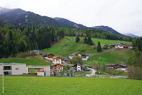 Landscape of Santa Maddalena and exterior village buildings at Val di Funes  land of the pale mountains and beautiful valley in the Dolomites also one of UNESCO World Heritage site- South Tyrol  Italy