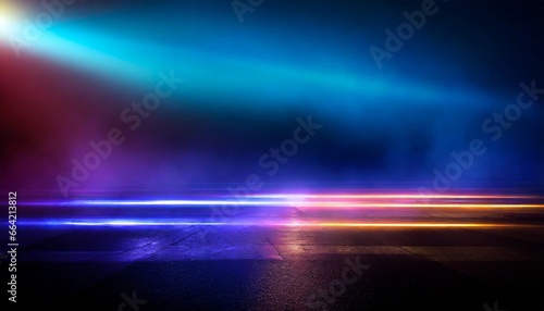 Dark background of empty foggy wet asphalt in the night illuminated by a searhlight © CreativeStock