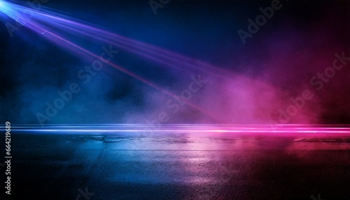 Dark background of empty foggy wet asphalt in the night illuminated by a searhlight