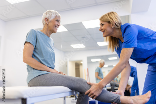 Physiotherapy doctor, senior patient and leg surgery, physical therapy and orthopedic healing. Physiotherapist, chiropractor and nurse help elderly injury, osteoporosis and arthritis rehabilitation