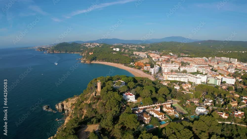 aerial views of the coast and cliffs of Fenals on the Costa Brava of Gerona, Lloret De Mar, urbanizations and vegetation aerial views of the coast and cliffs of Fenals on the Costa Brava of Gerona, Lloret De Mar, urbanizations and vegetation