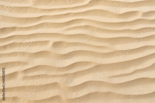Closeup of sand pattern of a beach in the summer.