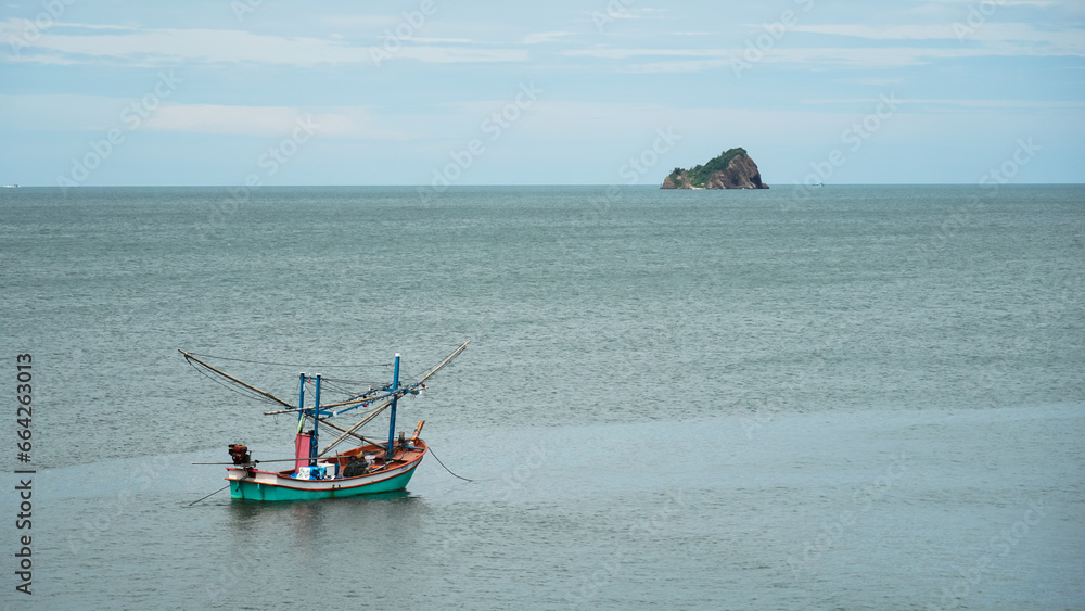 Small fishing boat moored in the sea