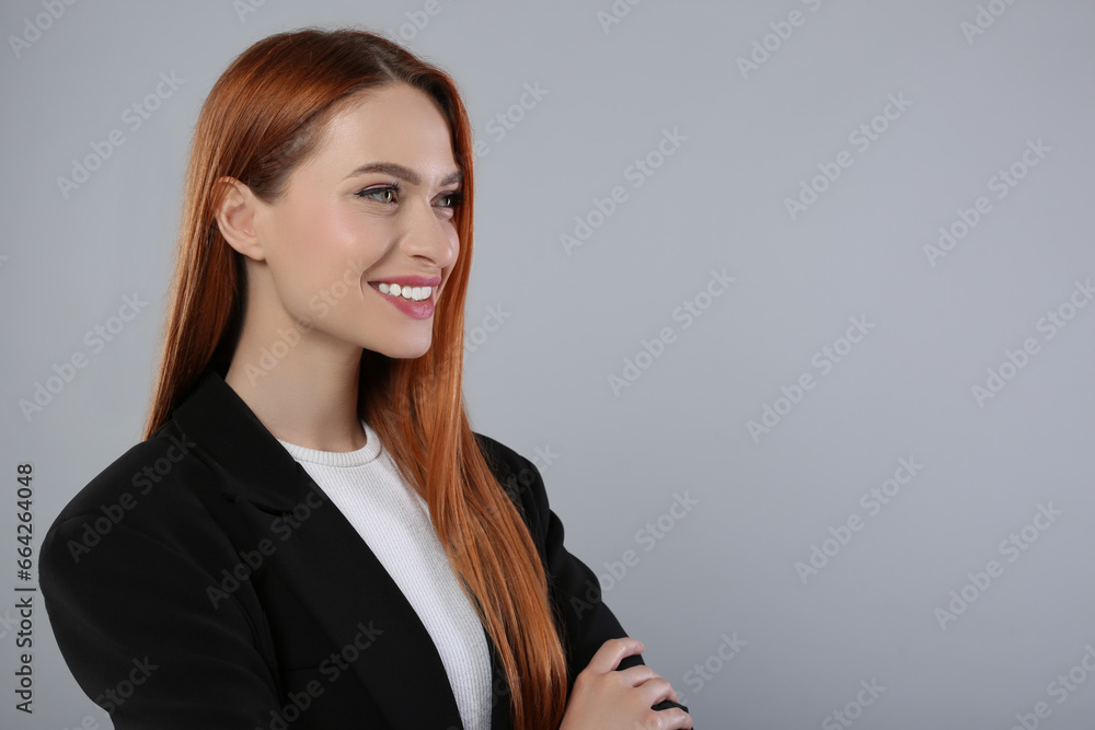 Portrait of beautiful young woman on light gray background, space for text Portrait of beautiful young woman on light gray background, space for text