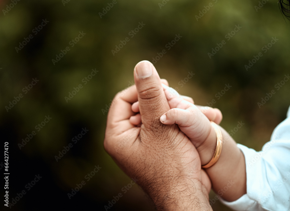 parent and baby hands