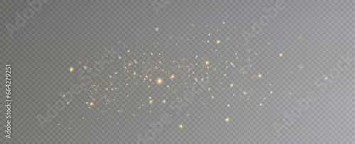 Golden sequins glow with many lights. Glittering dust. Luxurious background of golden particles.	