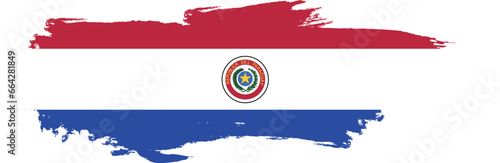 Paraguay flag on brush paint stroke.