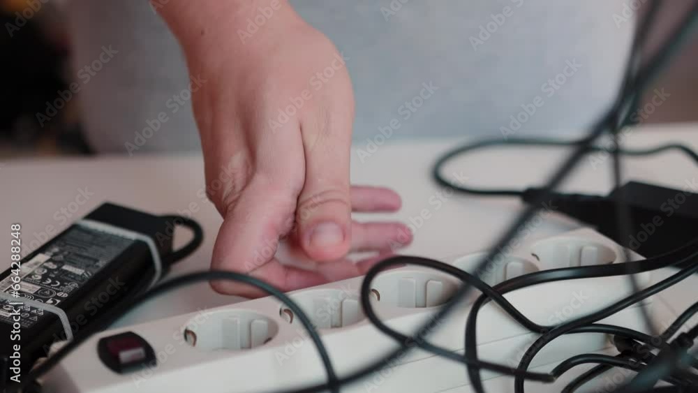 Unsafe removal of electrical plugs and wires from a switched on electrical filter. Concept of