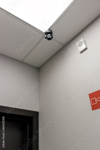 Close-up surveillance cameras or CCTV cameras installed on indoor poles