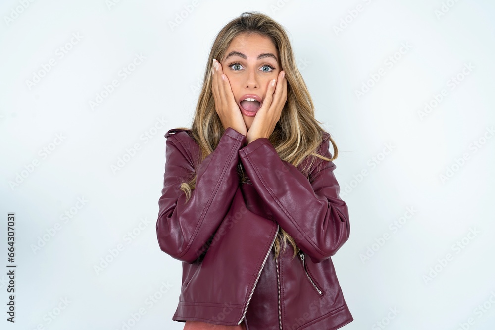 Beautiful young woman wearing jacket Pleasant looking cheerful, Happy reaction Beautiful young woman wearing jacket Pleasant looking cheerful, Happy reaction