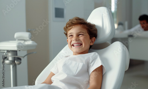kid smiling on a dental chair