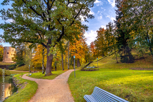 Public old garden park on a sunny autumnal day