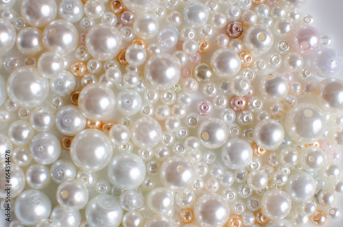 Elegant collection of lustrous pearl white beads  perfect for jewelry and craft projects