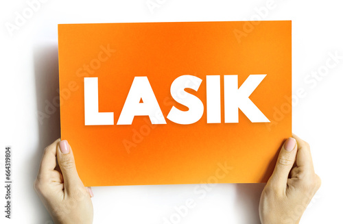 LASIK commonly referred to as laser eye surgery or laser vision correction, text concept on card for presentations and reports photo