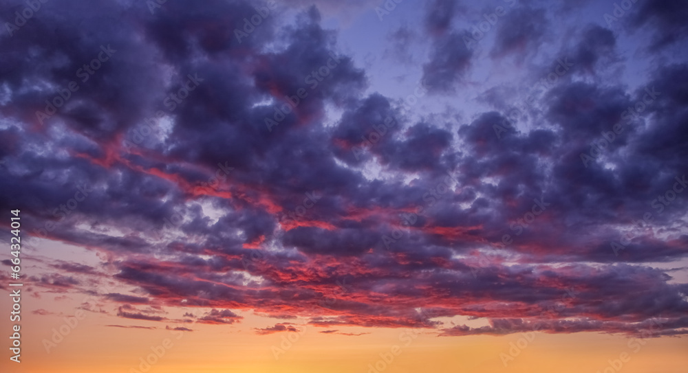 Beautiful sunset with pink and purple sky and clouds