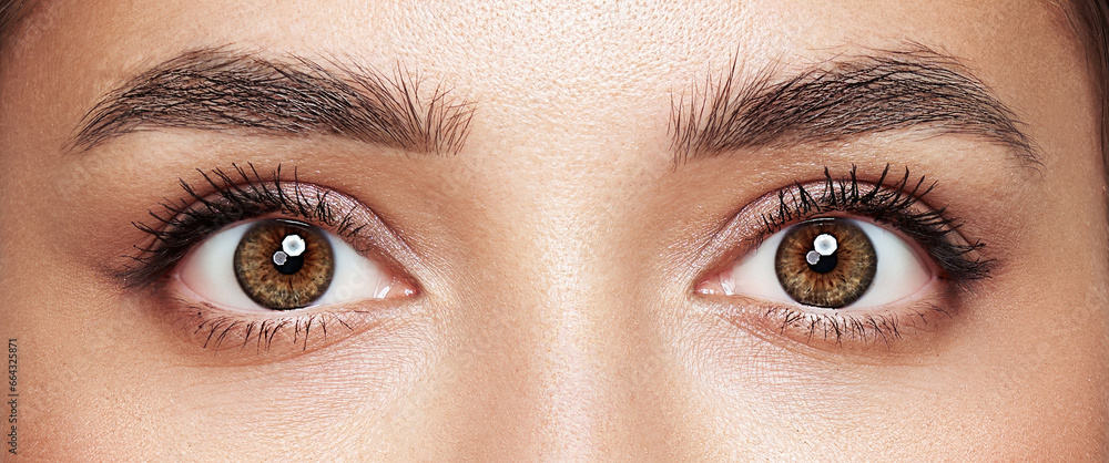 Beautiful female eyes with long eyelashes. Eyelash extensions. Makeup, cosmetics, beauty. Close up, macro Beautiful female eyes with long eyelashes. Eyelash extensions. Makeup, cosmetics, beauty. Close up, macro