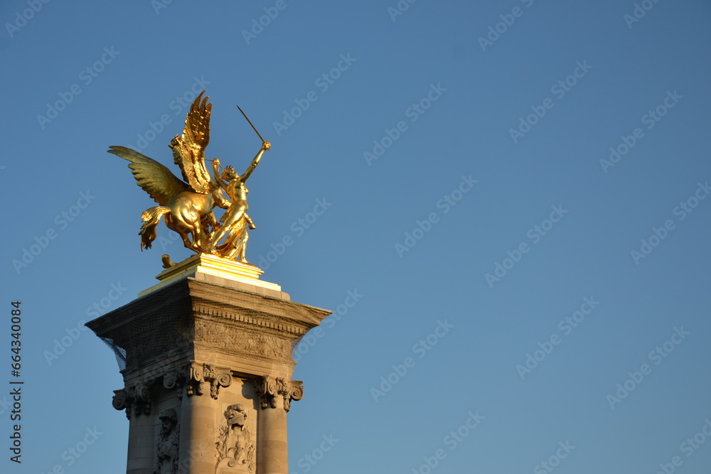 gold statue in paris