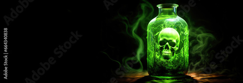Bottle of poison with skull, green smoke on dark background.  photo