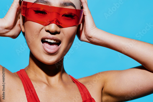 Red woman sunglasses beauty blue smiling