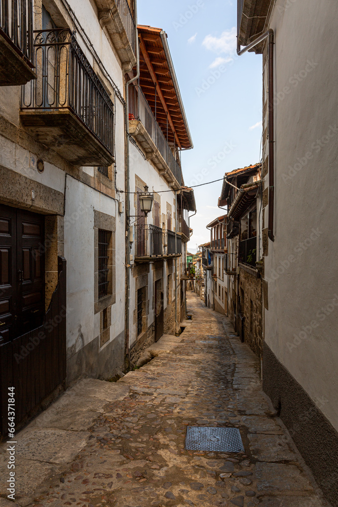 Narrow street in the town of Candelario, Salamanca, Castilla y León, Spain.