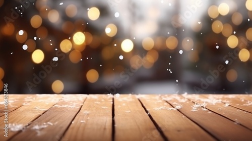 Background for the winter holiday New Year with a wooden surface covered in snow and a light-blurred background with Christmas lights.
